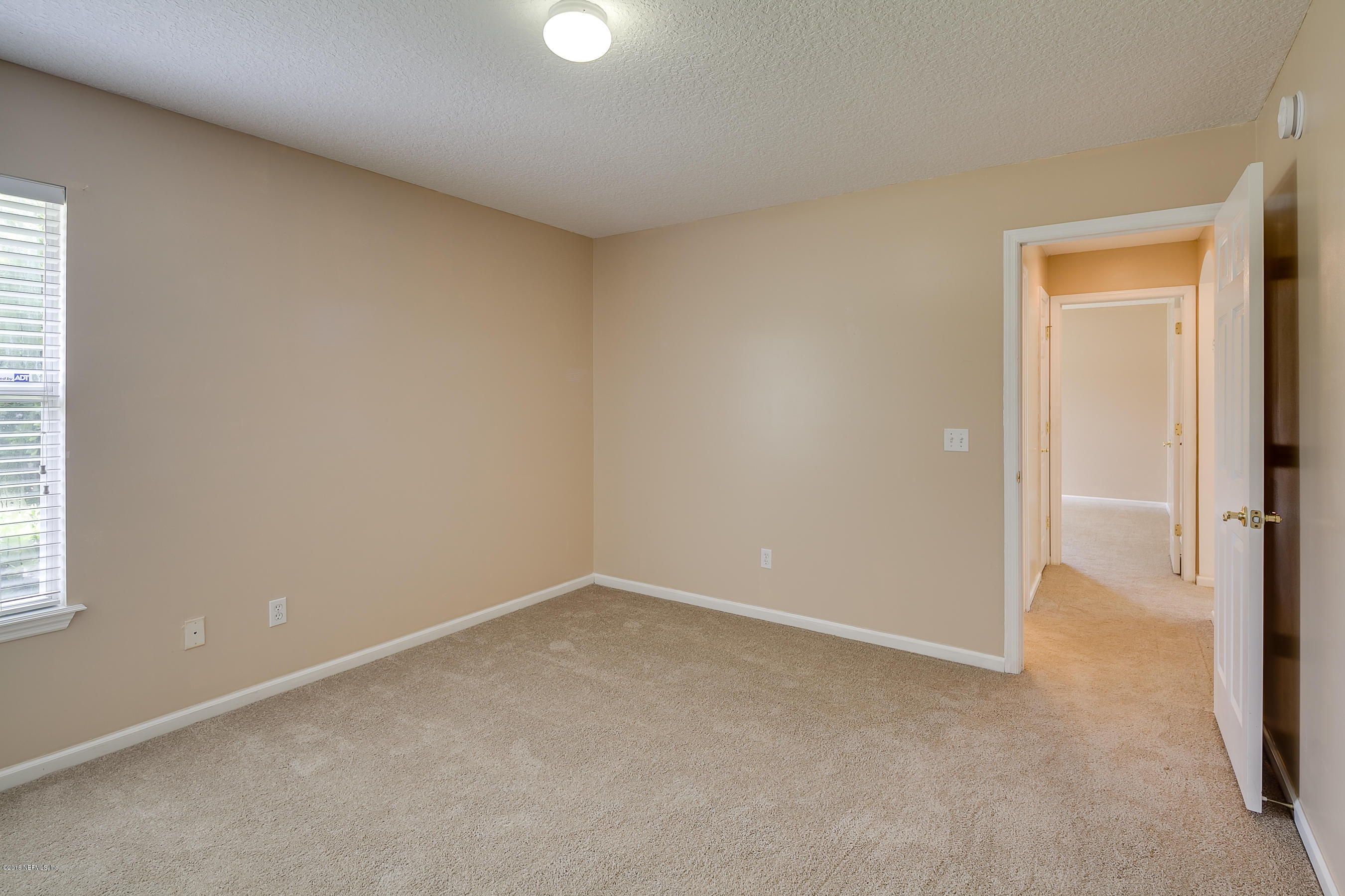 1727 Margarets Walk Road Fleming Island, FL 32003 - Photo 28 of 53 an empty room with a window