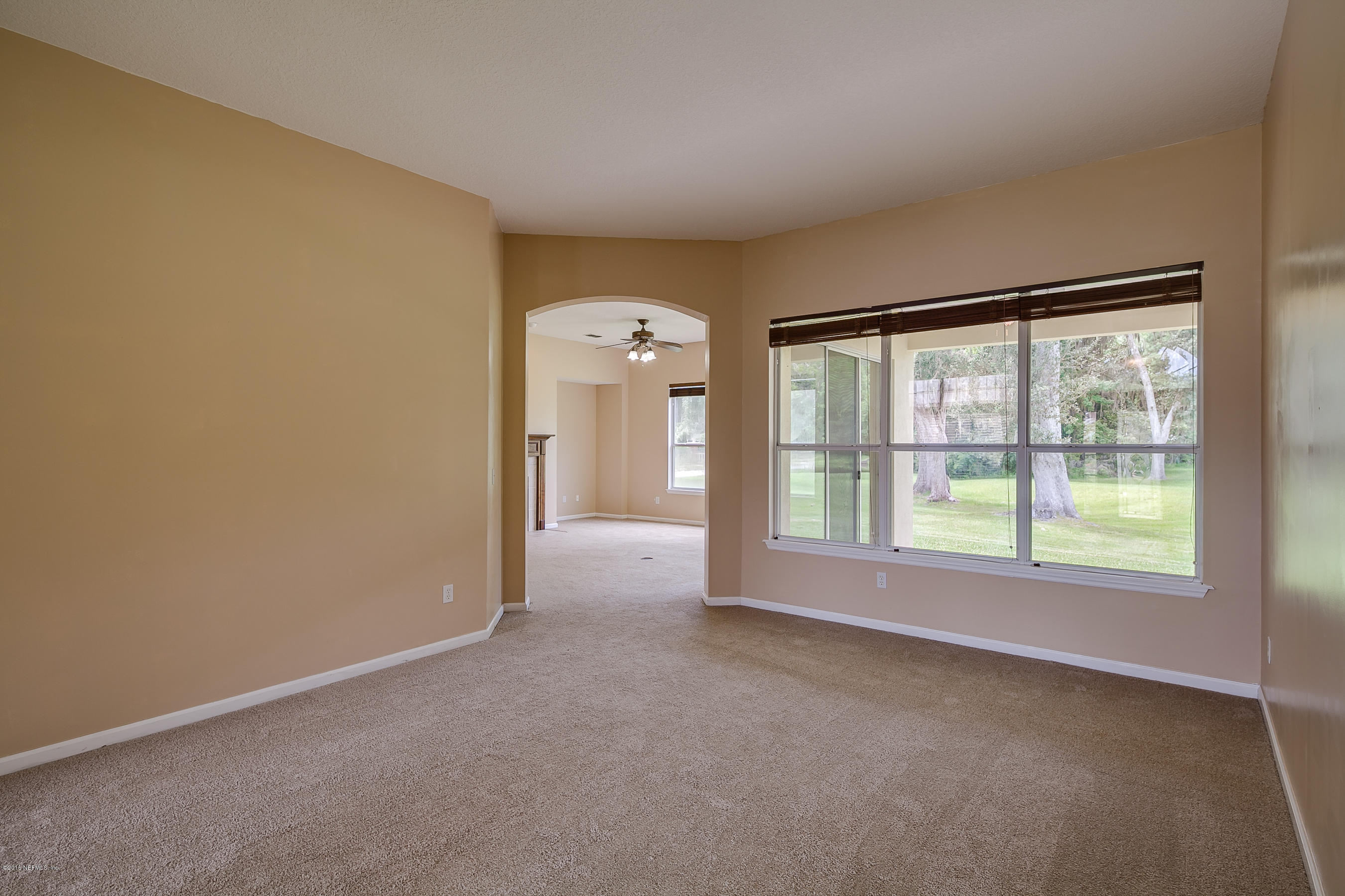 1727 Margarets Walk Road Fleming Island, FL 32003 - Photo 4 of 53 an empty room with a window