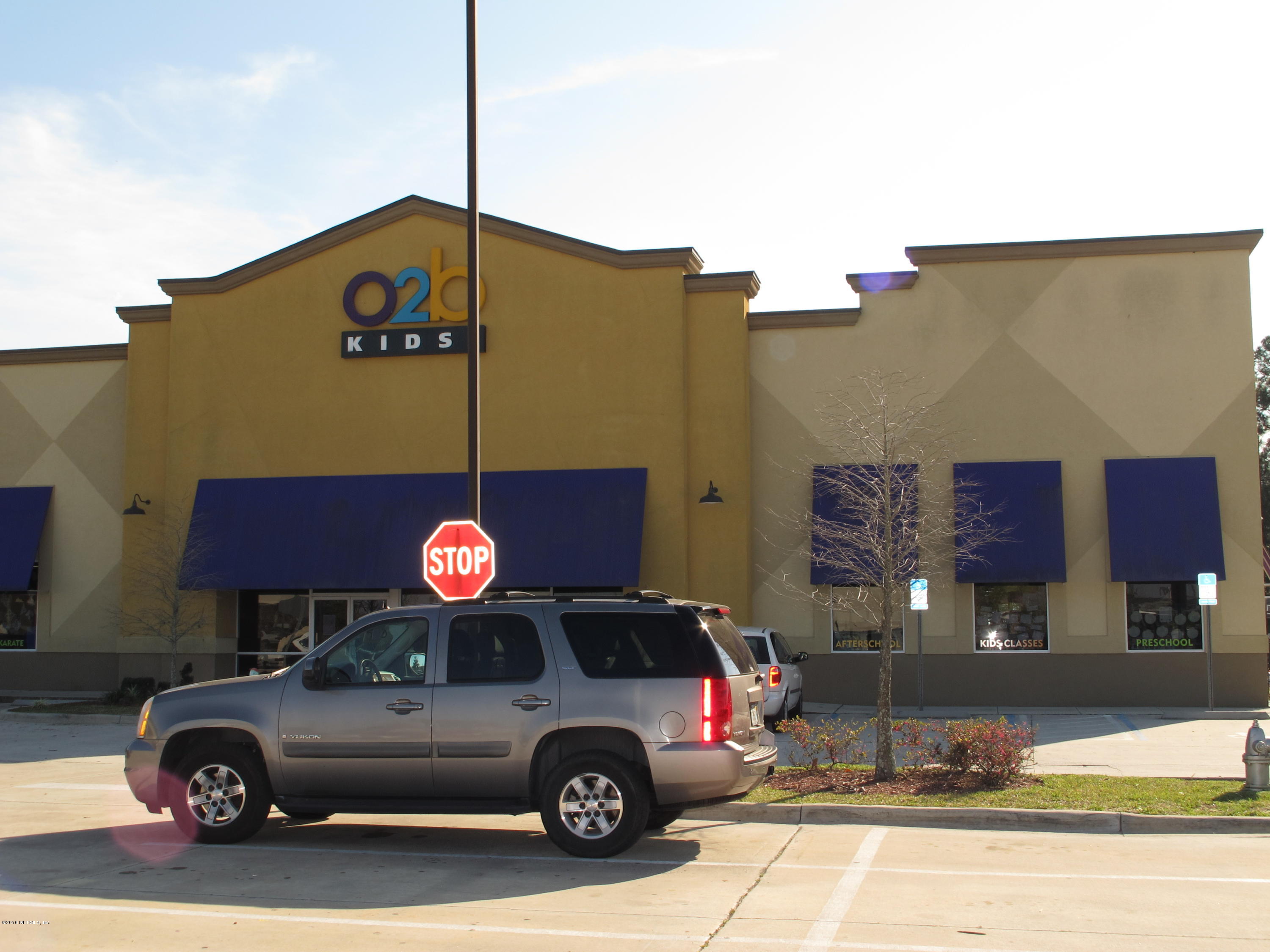 1727 Margarets Walk Road Fleming Island, FL 32003 - Photo 42 of 53 a car parked in front of a building
