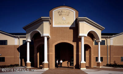 1727 Margarets Walk Road Fleming Island, FL 32003 - Photo 48 of 53 a view of a brick building with large windows