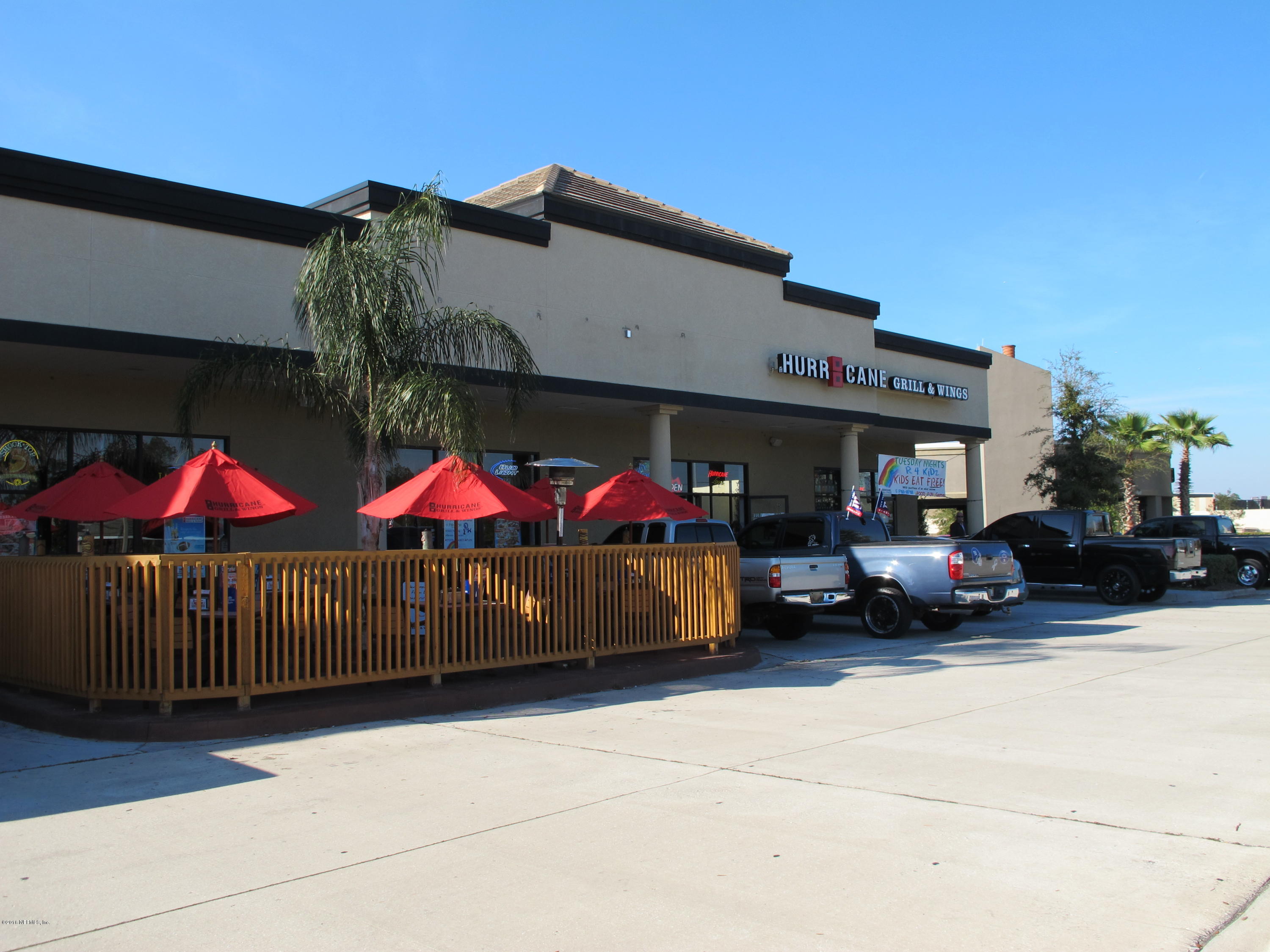 1727 Margarets Walk Road Fleming Island, FL 32003 - Photo 53 of 53 a car parked in front of a house