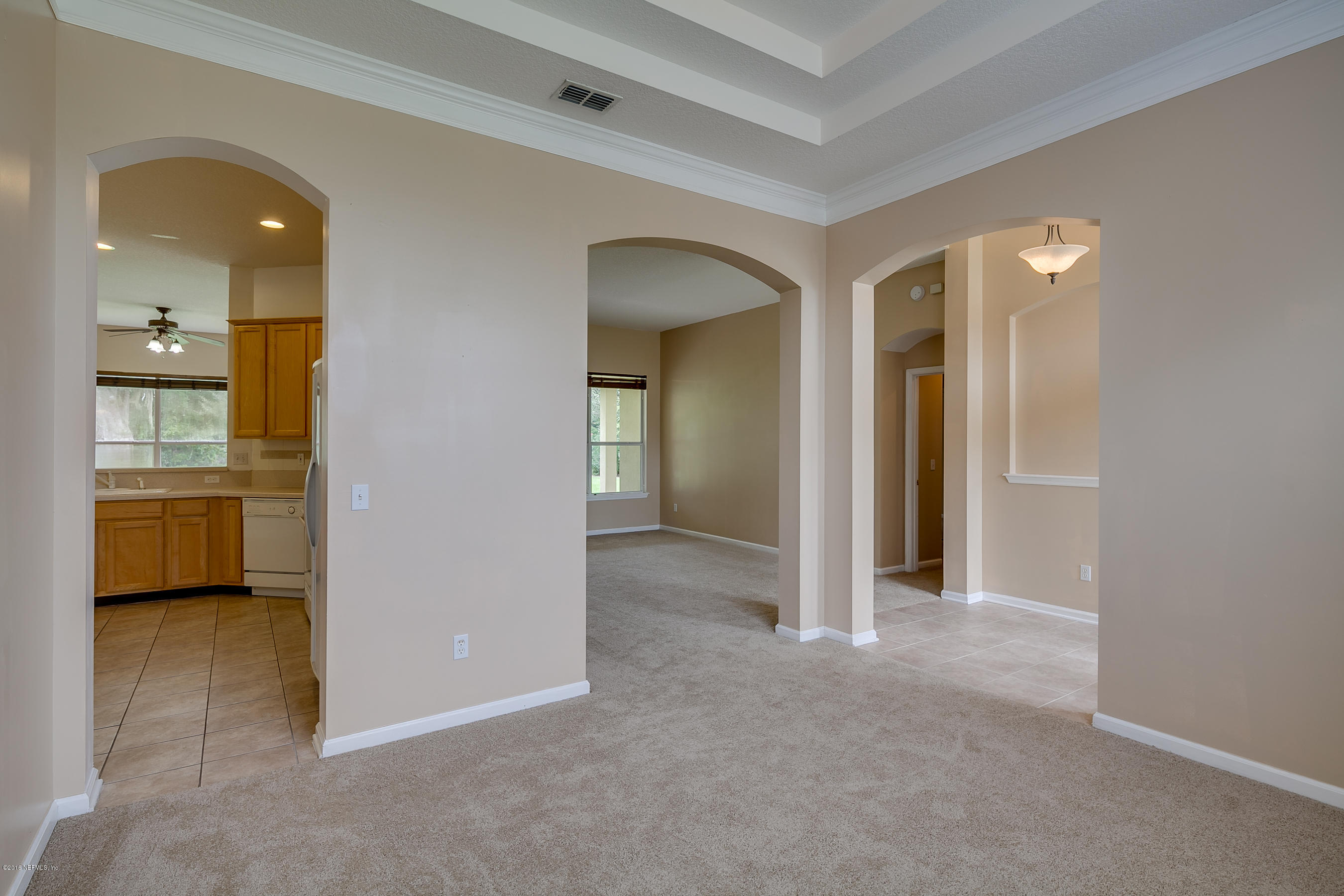 1727 Margarets Walk Road Fleming Island, FL 32003 - Photo 7 of 53 hallway with wooden floor and a bathroom