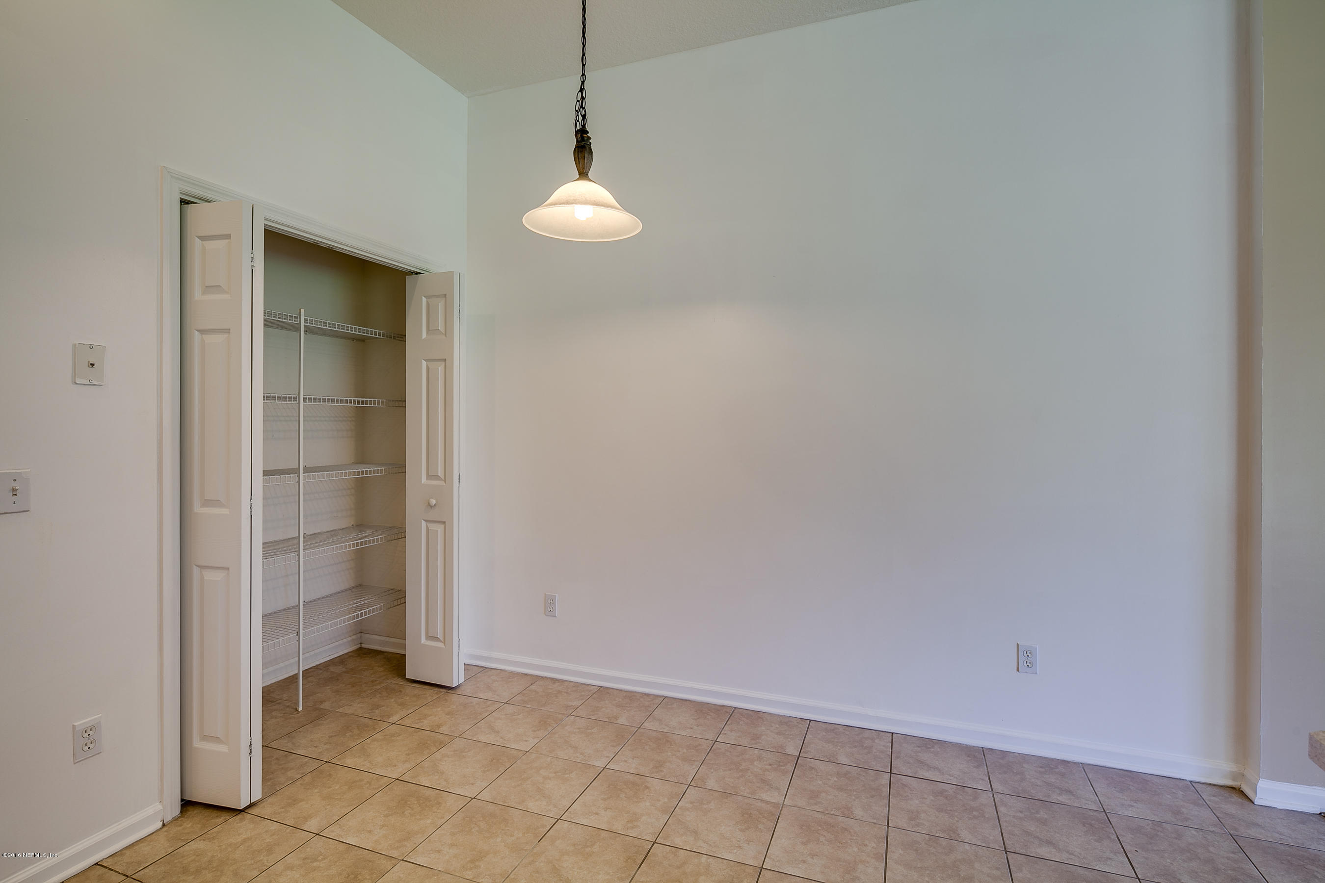 1727 Margarets Walk Road Fleming Island, FL 32003 - Photo 10 of 53 an empty room with closet and a window