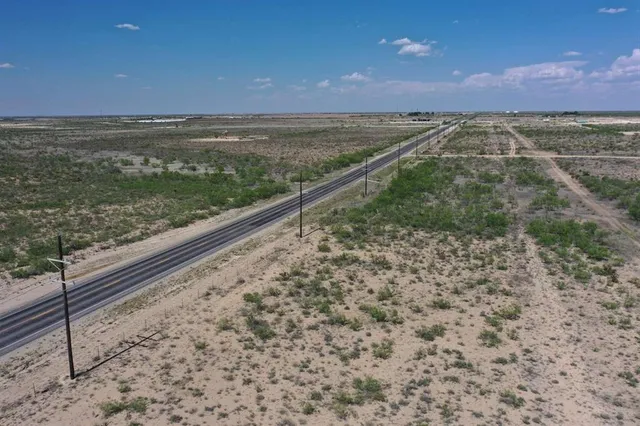 a view of an outdoor space and a mountain