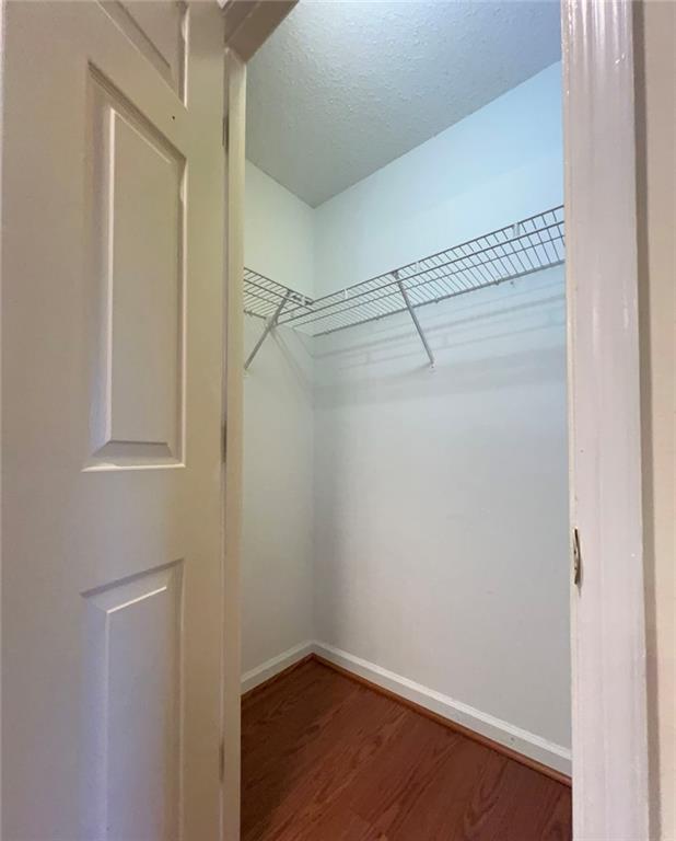 1800 Clairmont Lake, Unit 711 Decatur, GA 30033 - Photo 22 of 40 a view of a room with racks on the wall