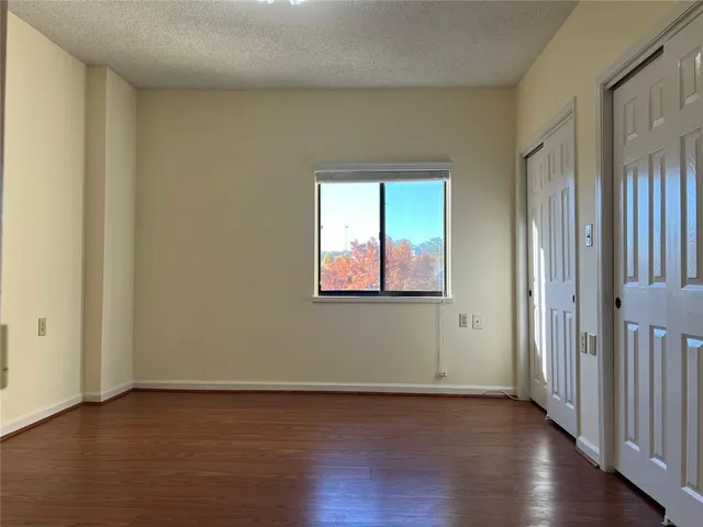 a living room with furniture and window