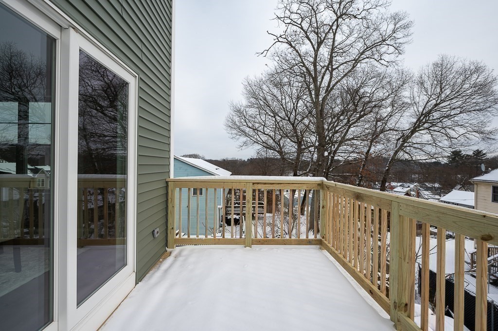 29 3rd Worcester, MA 01602 - Photo 22 of 38 a view of a balcony with wooden floor and fence