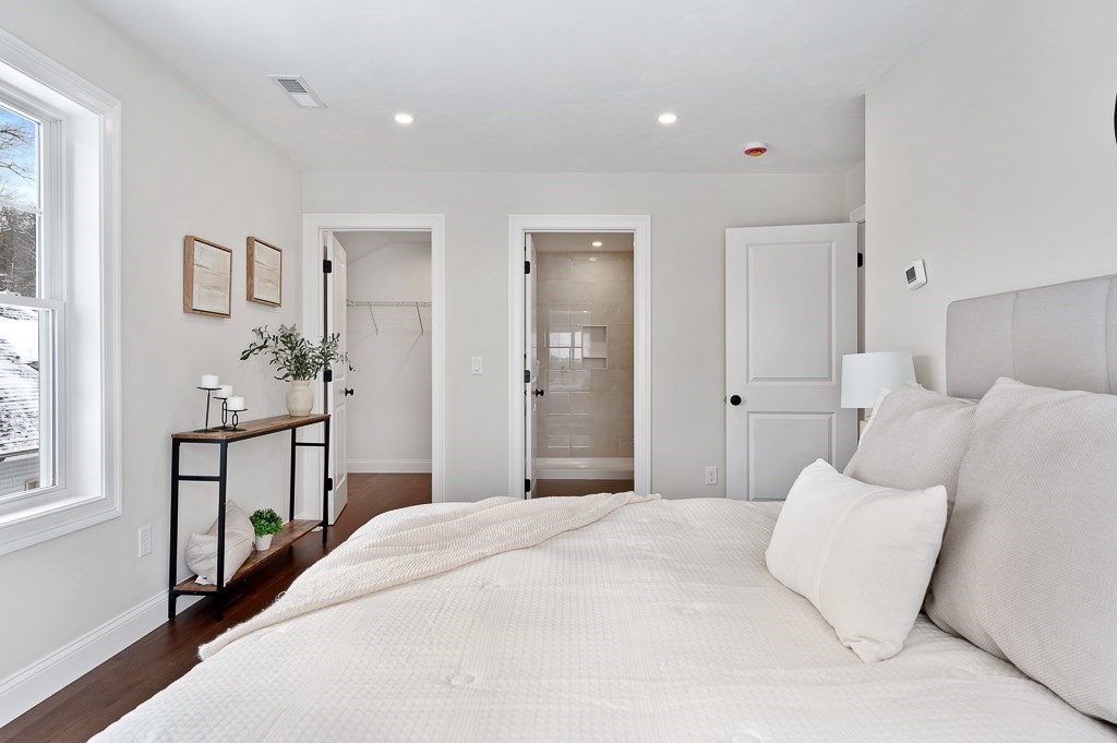 29 3rd Worcester, MA 01602 - Photo 38 of 38 a bedroom with a bed and a large mirror