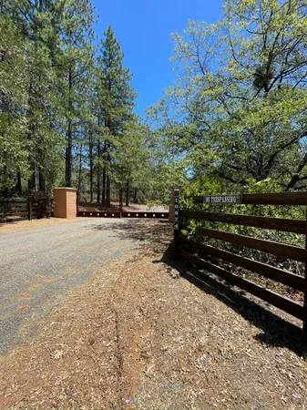 a view of street with wooden bridge