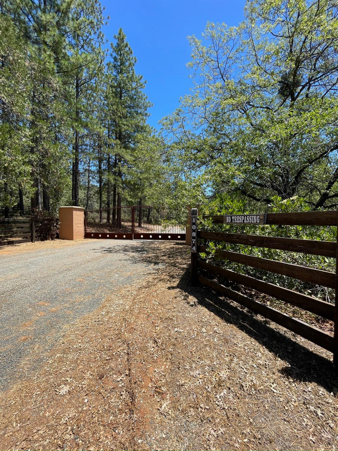 10874 Marysville Road Dobbins, CA 95935 - Photo 1 of 46 a view of street with wooden bridge