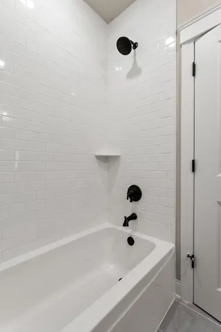a bathroom with a bathtub
