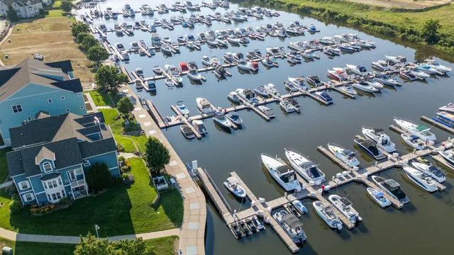 a front view of a residential apartment building with a yard