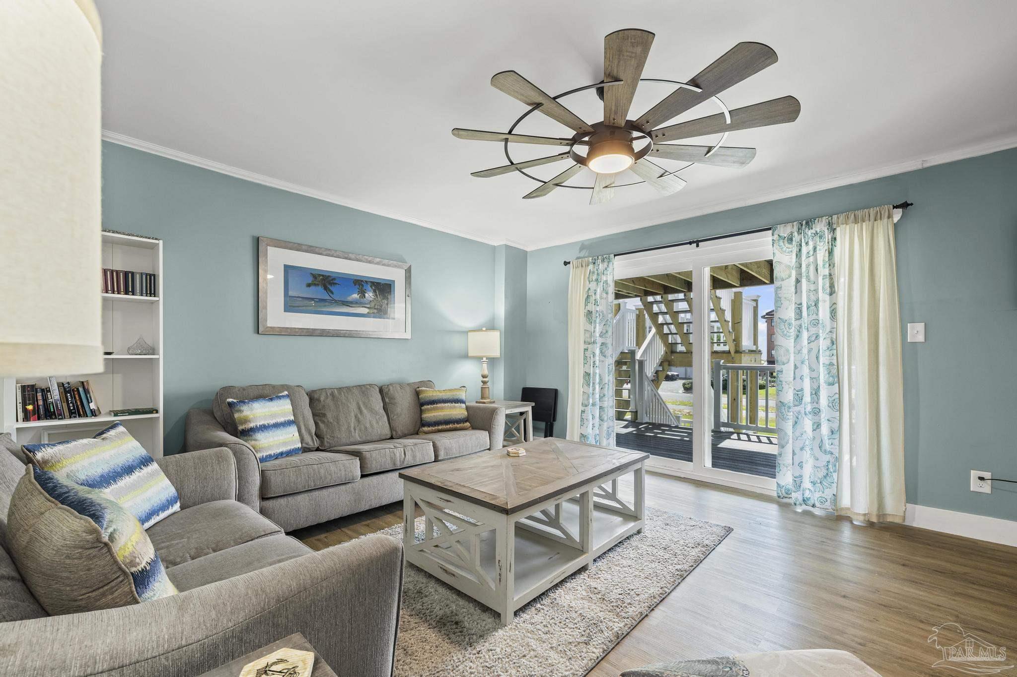 1100 Fort Pickens Road, Unit A13 Pensacola Beach, FL 32561 - Photo 14 of 63 a living room with furniture
