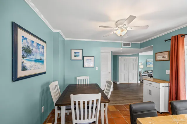 a kitchen with stainless steel appliances a refrigerator sink and cabinets
