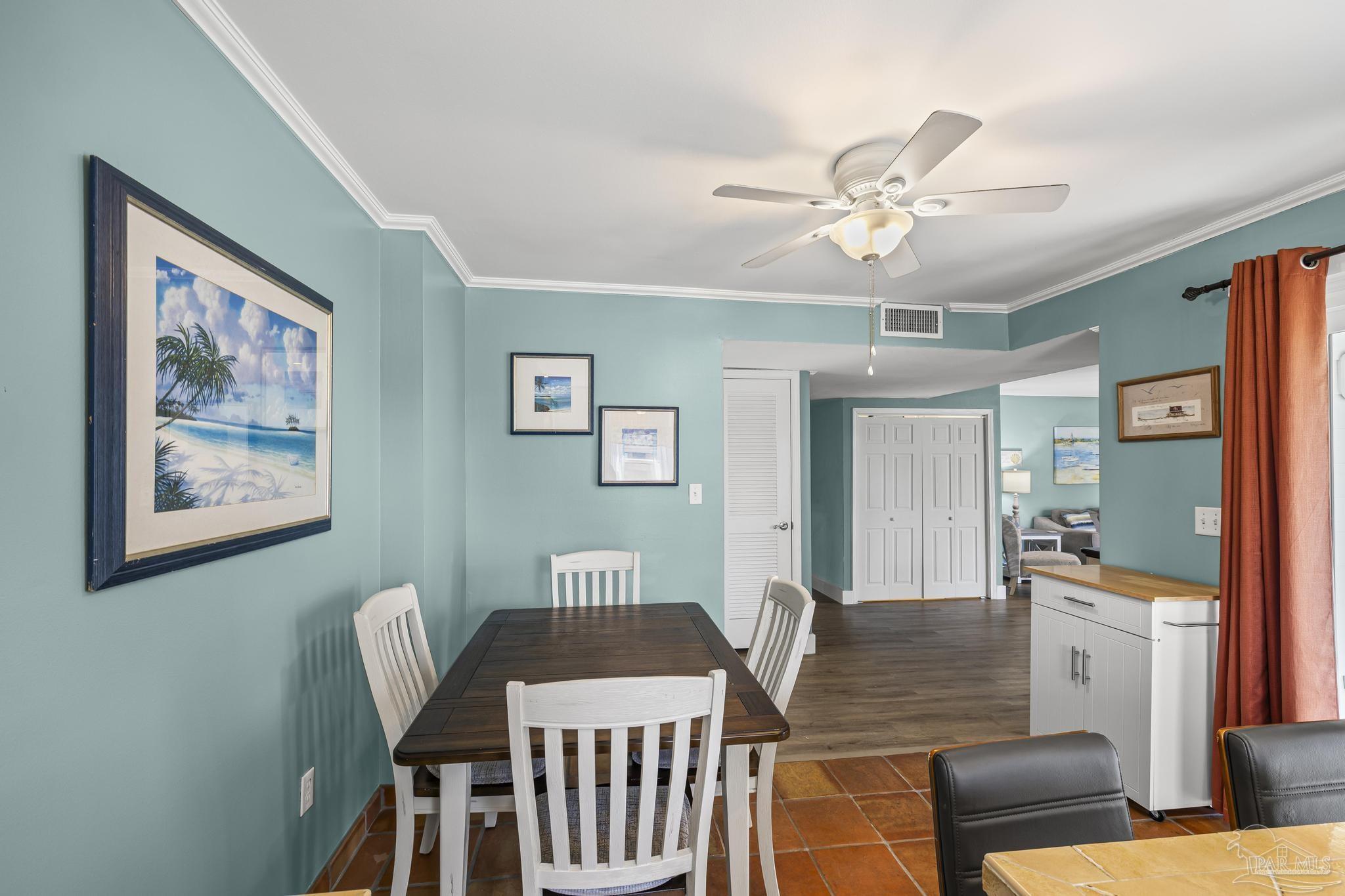 1100 Fort Pickens Road, Unit A13 Pensacola Beach, FL 32561 - Photo 20 of 63 a view of a livingroom with furniture and a chandelier fan