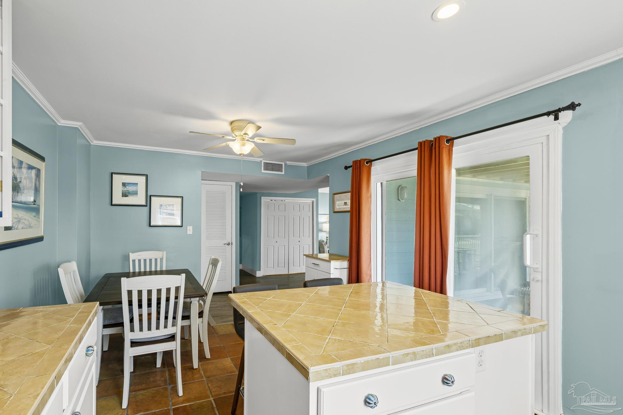 1100 Fort Pickens Road, Unit A13 Pensacola Beach, FL 32561 - Photo 25 of 63 a view of kitchen with furniture and wooden floor