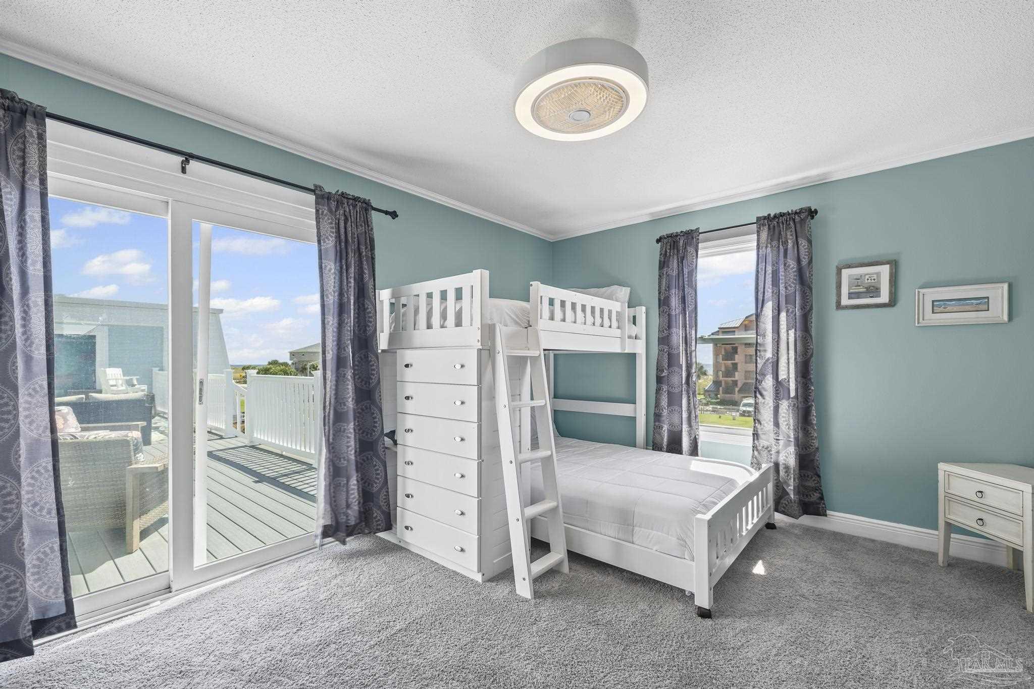 1100 Fort Pickens Road, Unit A13 Pensacola Beach, FL 32561 - Photo 30 of 63 a bedroom with a bed and a window