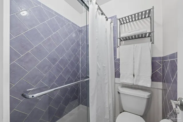 a view of a swimming pool with a lounge chairs