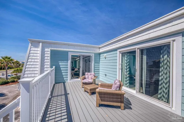 a view of a swimming pool with a lounge chairs
