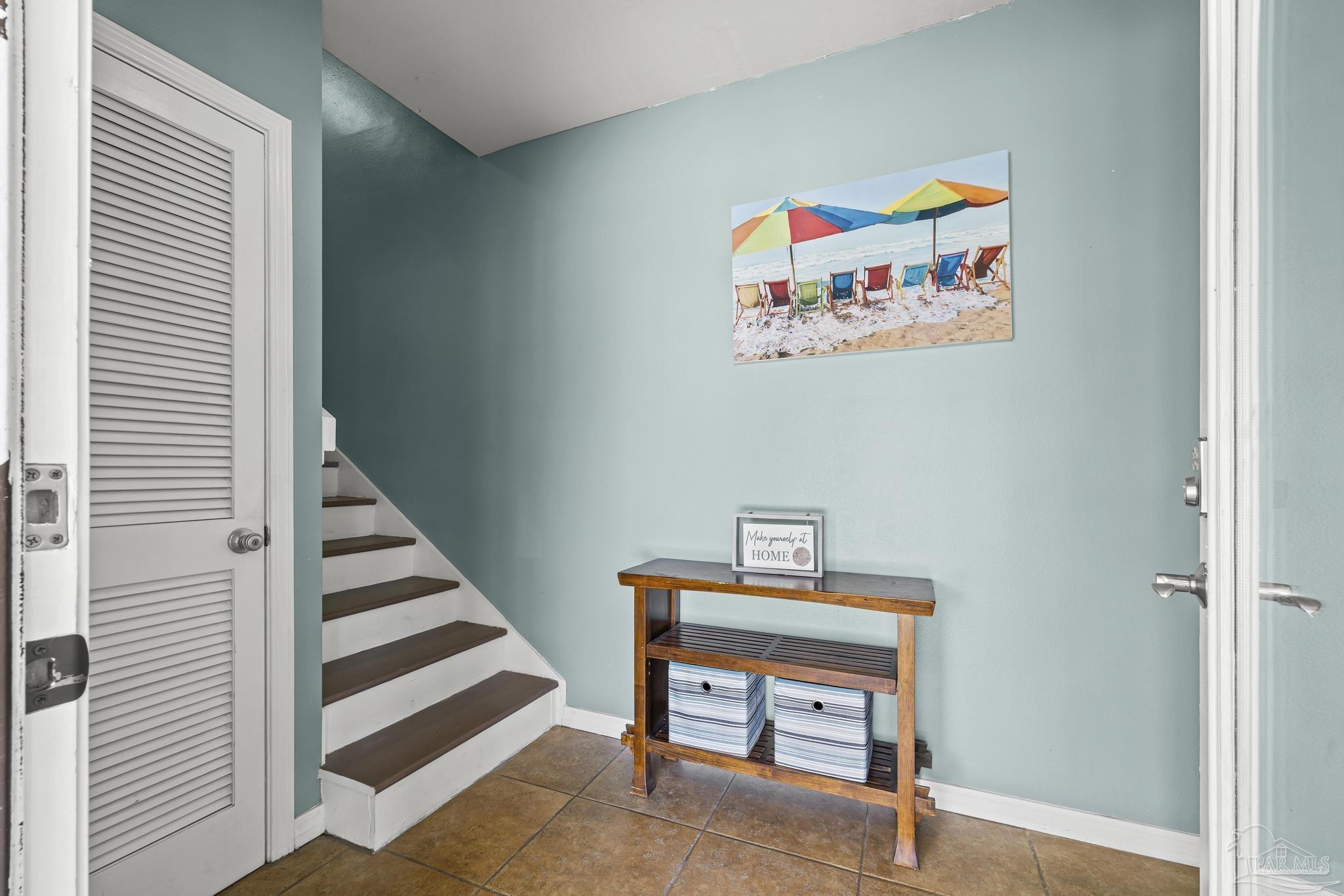 1100 Fort Pickens Road, Unit A13 Pensacola Beach, FL 32561 - Photo 9 of 63 a view of a hallway with toys