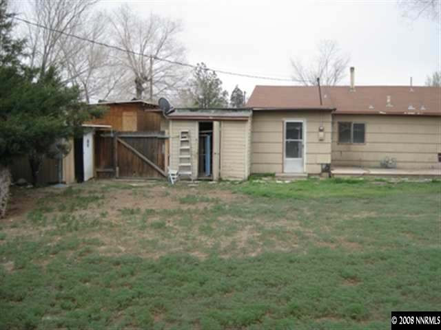 1955 Citron Street Reno, NV 89512 - Photo 3 of 3 a front view of a house with a yard