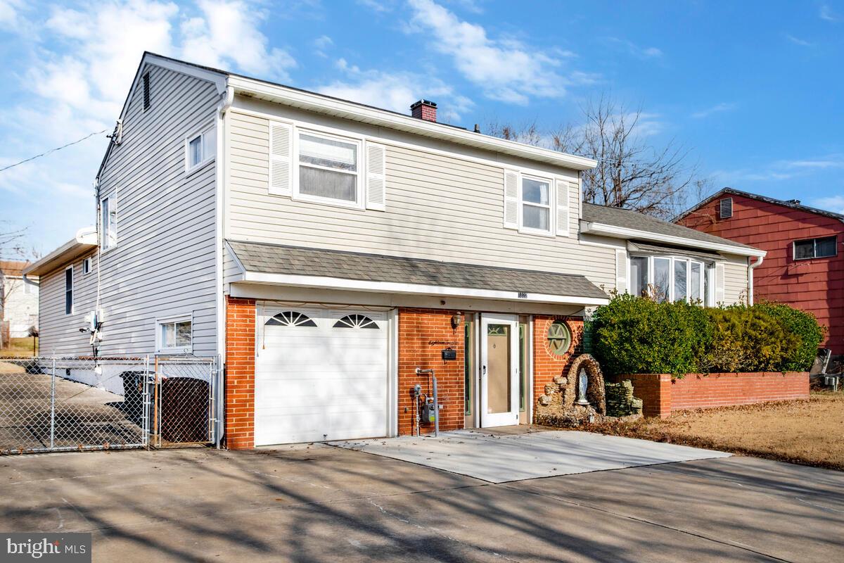 1822 Wycliffe Road Baltimore, MD 21234 - Photo 2 of 44 exterior house, driveway with 5 cars