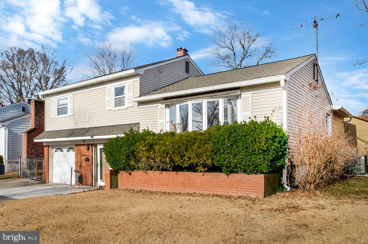 1822 Wycliffe Road Baltimore, MD 21234 - Photo 3 of 44 a front view of a house with a yard and outdoor seating