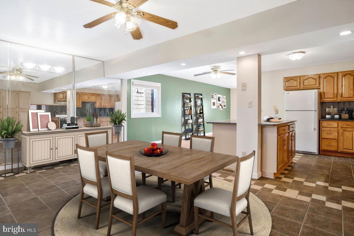 1822 Wycliffe Road Baltimore, MD 21234 - Photo 5 of 44 a view of a dining room with furniture and a kitchen