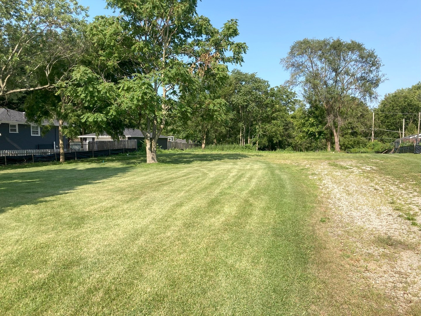 322 South Prairie Road New Lenox, IL 60451 - Photo 1 of 8 a swimming pool with outdoor seating and yard