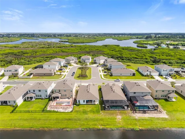 a view of a city with lawn chairs