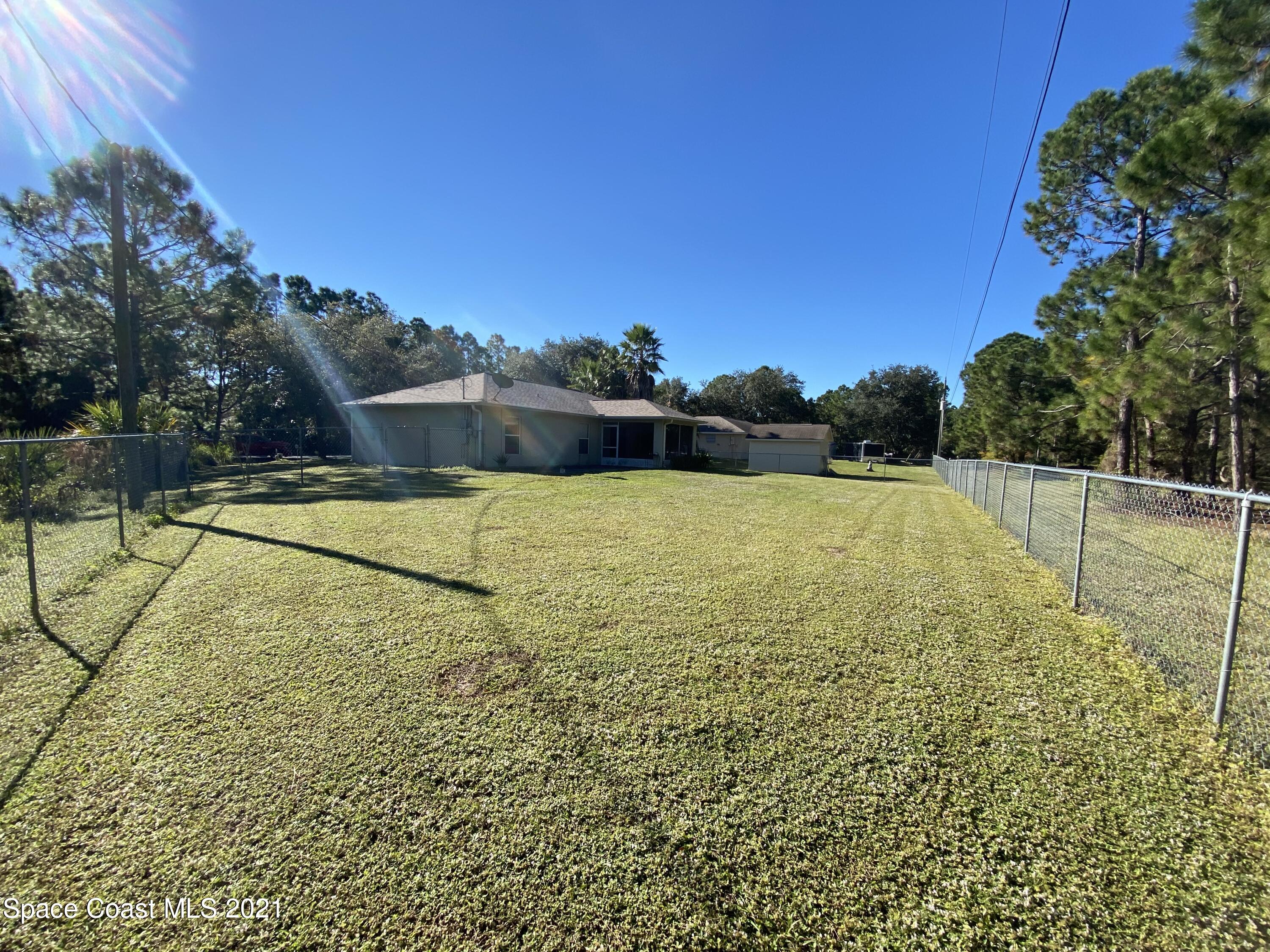 2481 Anchor Road Southeast Palm Bay, FL 32909 - Photo 8 of 32 a view of a swimming pool