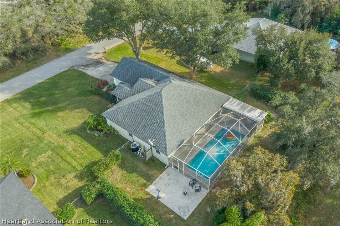 4021 Loquat Road Sebring, FL 33875 - Photo 24 of 26 a view of a house with a yard