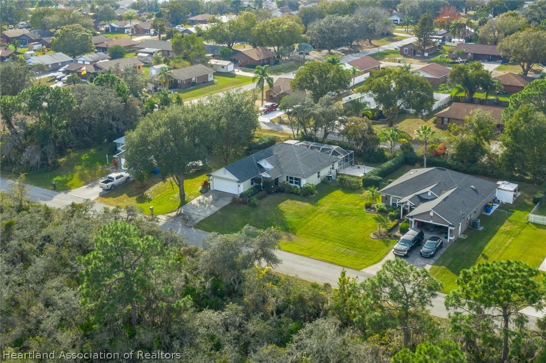4021 Loquat Road Sebring, FL 33875 - Photo 25 of 26 an aerial view of residential house with outdoor space and swimming pool