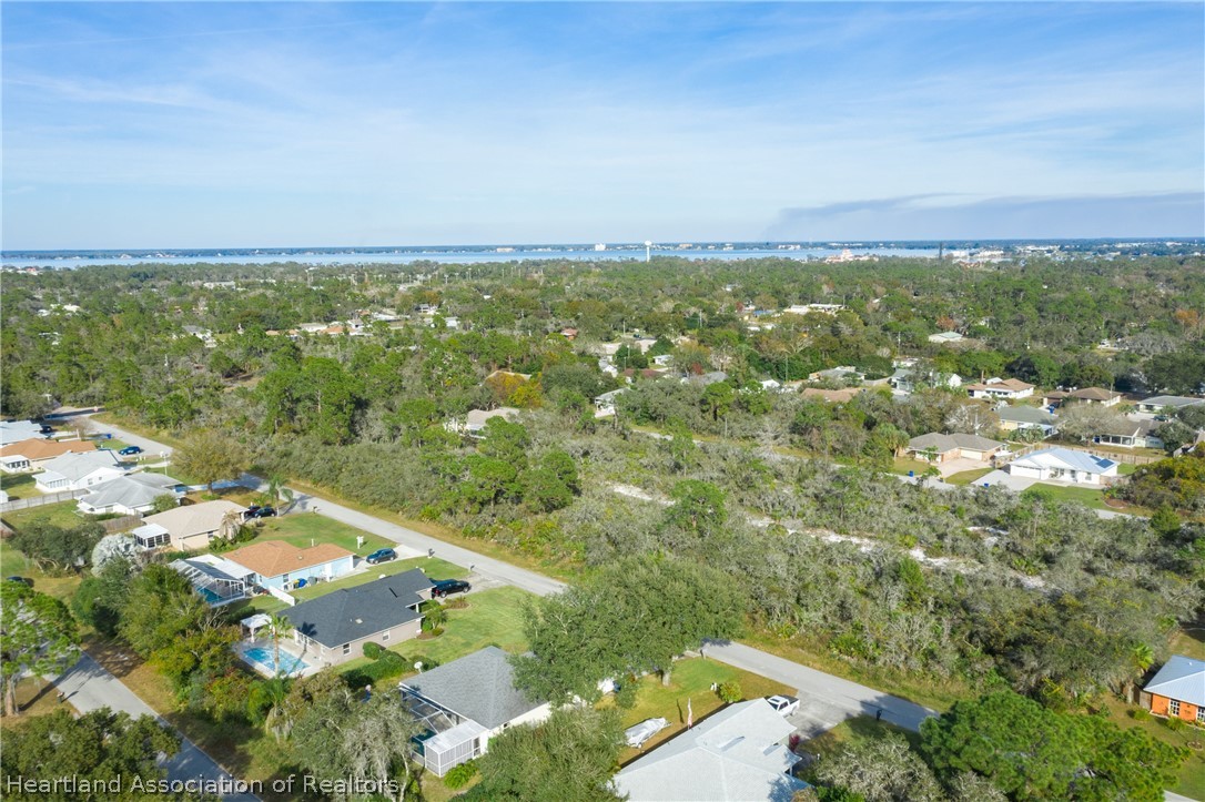 4021 Loquat Road Sebring, FL 33875 - Photo 26 of 26 an aerial view of residential houses with outdoor space and trees