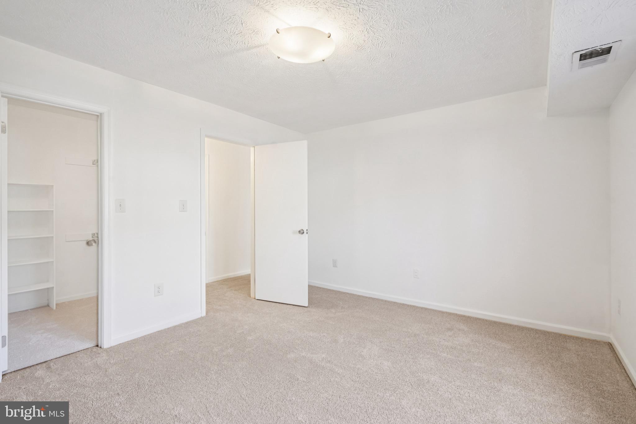 2203 Hunter's Run Drive Reston, VA 20191 - Photo 19 of 48 an empty room with a empty space