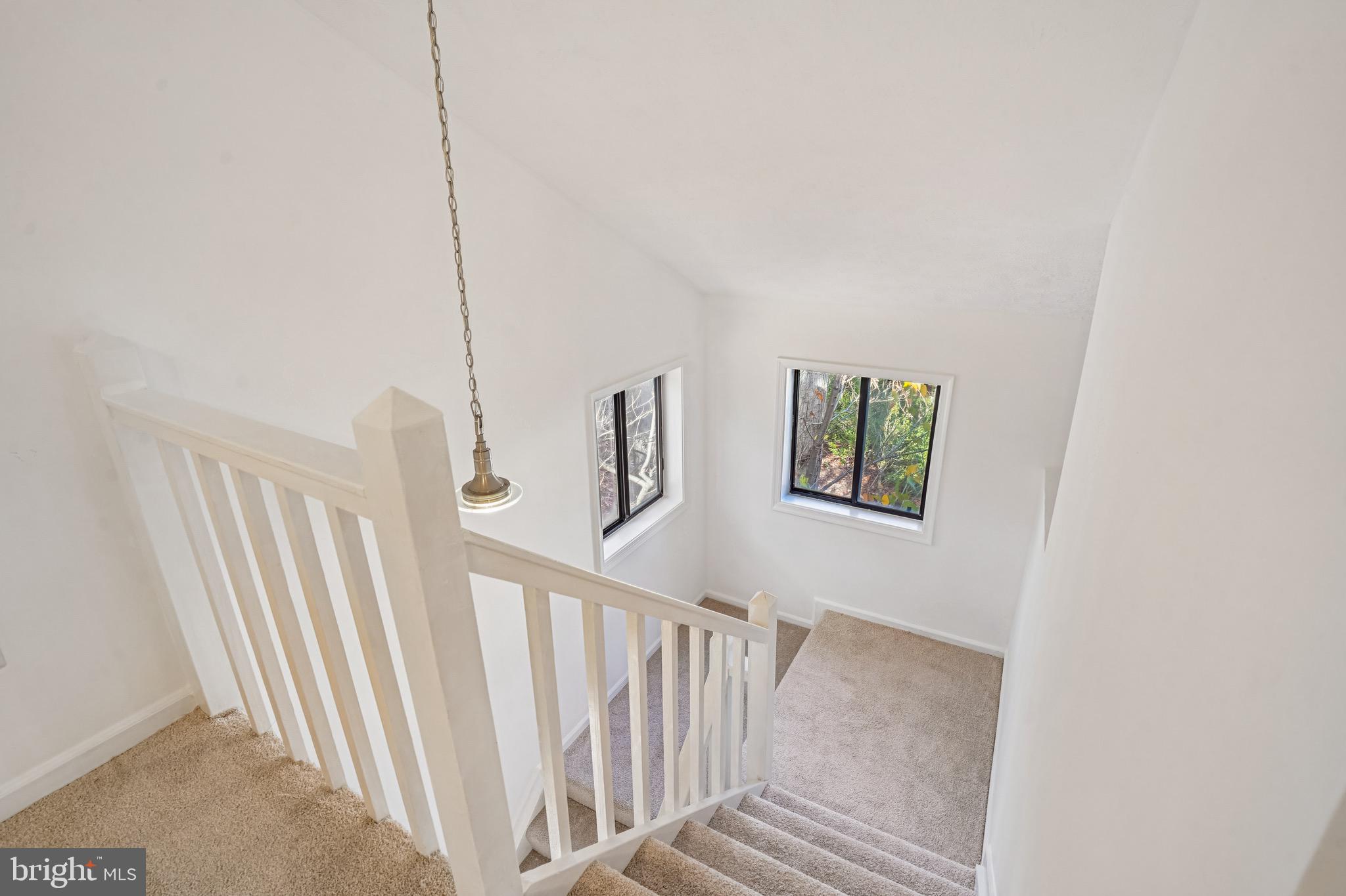 2203 Hunter's Run Drive Reston, VA 20191 - Photo 21 of 48 a view of a hallway with stairs