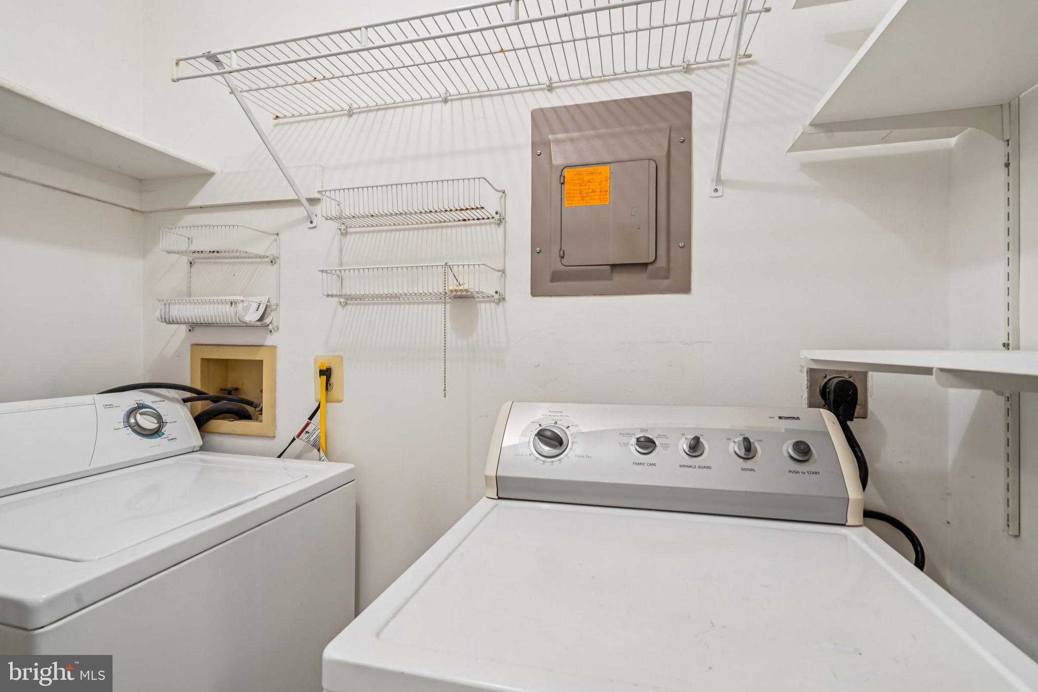 2203 Hunter's Run Drive Reston, VA 20191 - Photo 33 of 48 a utility room with dryer and washer