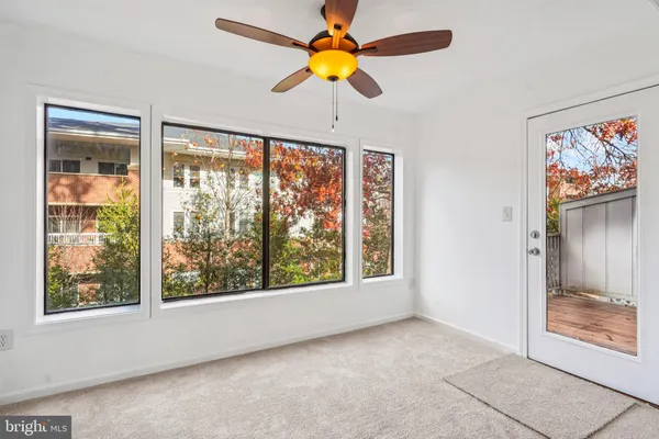 a view of a porch with wooden floor