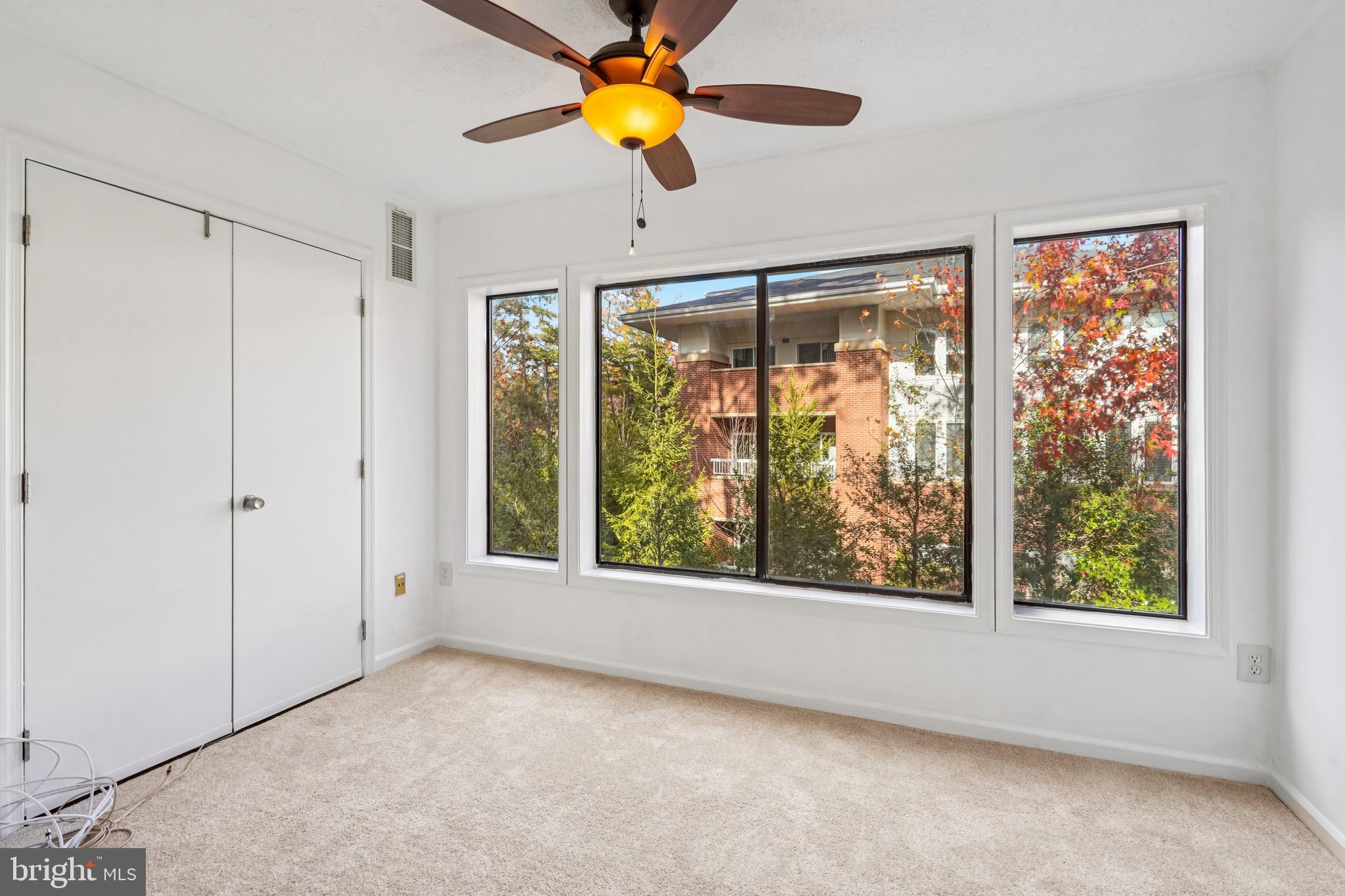 2203 Hunter's Run Drive Reston, VA 20191 - Photo 10 of 48 a view of room with window and ceiling fan