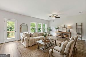 343 Shoals Trail Dallas, GA 30132 - Photo 4 of 10 a living room with furniture and a window