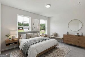 343 Shoals Trail Dallas, GA 30132 - Photo 7 of 10 a bedroom with a bed and a window