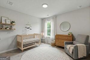 343 Shoals Trail Dallas, GA 30132 - Photo 9 of 10 a bedroom with furniture and a window