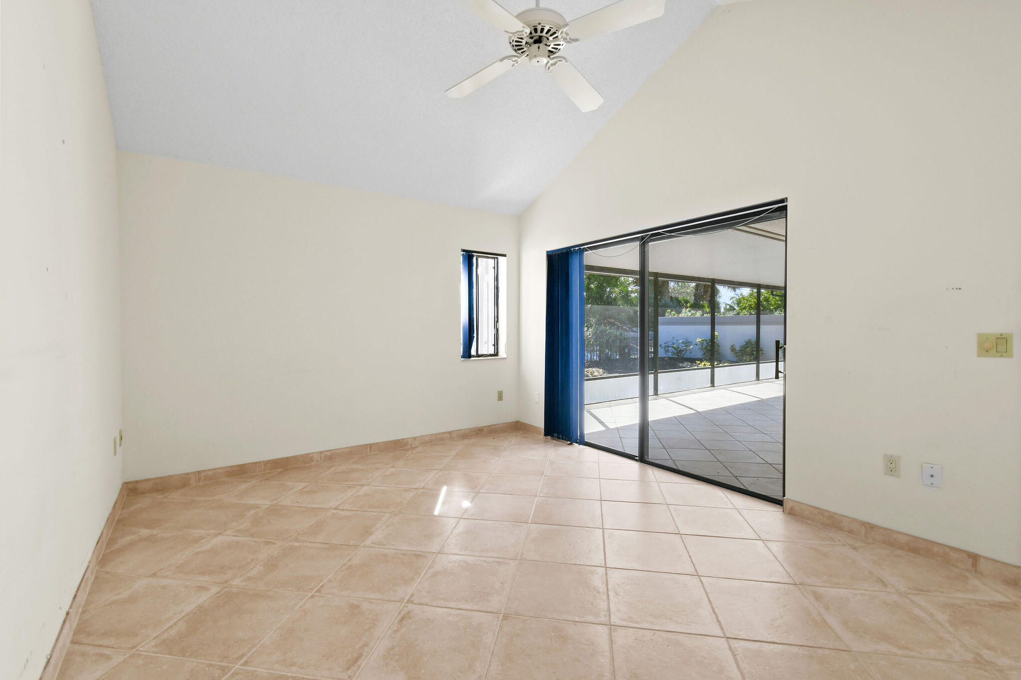 247 Ridge Road Jupiter, FL 33477 - Photo 12 of 28 a view of an empty room with glass door