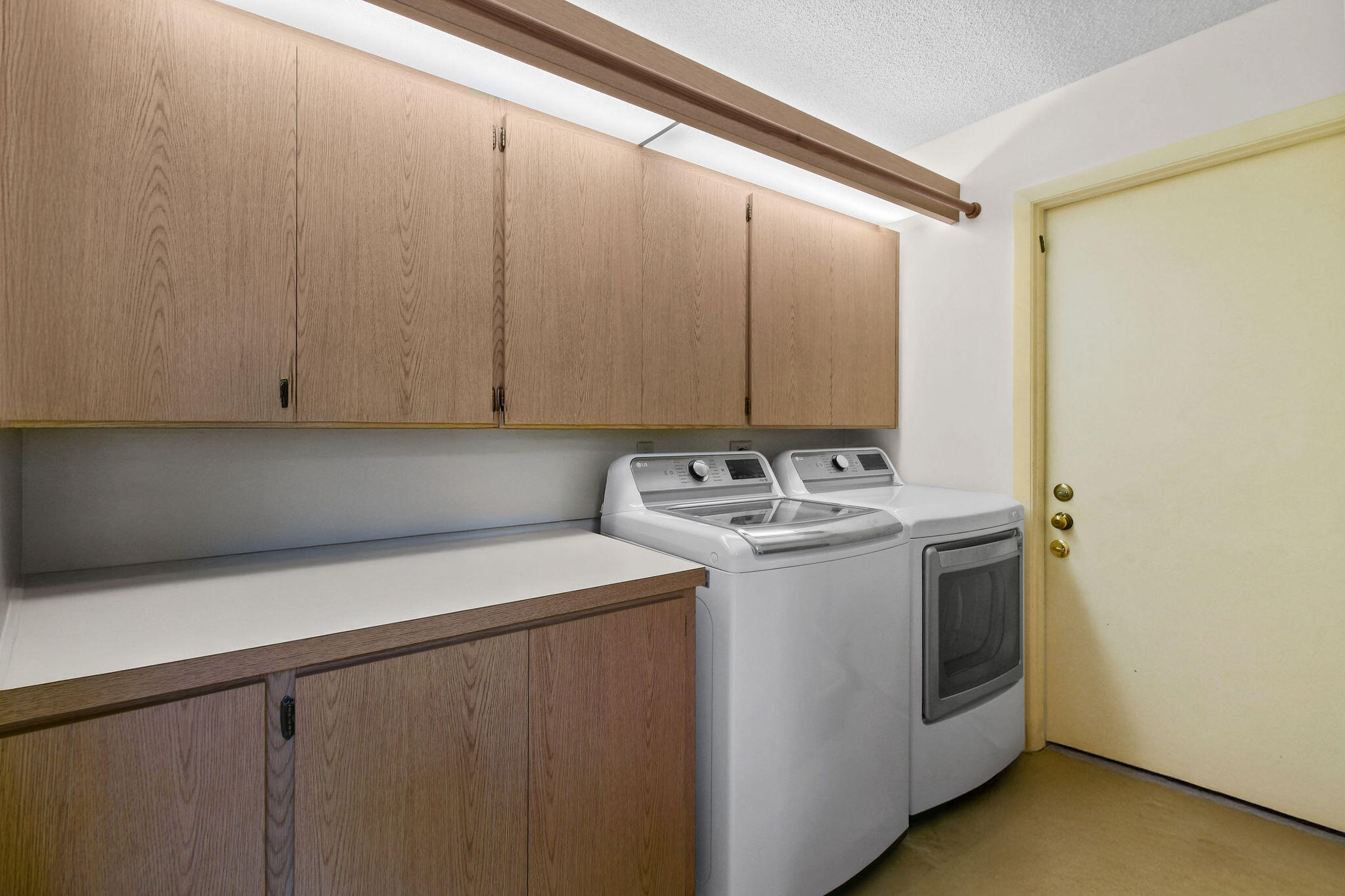 247 Ridge Road Jupiter, FL 33477 - Photo 22 of 28 a utility room with dryer and washer