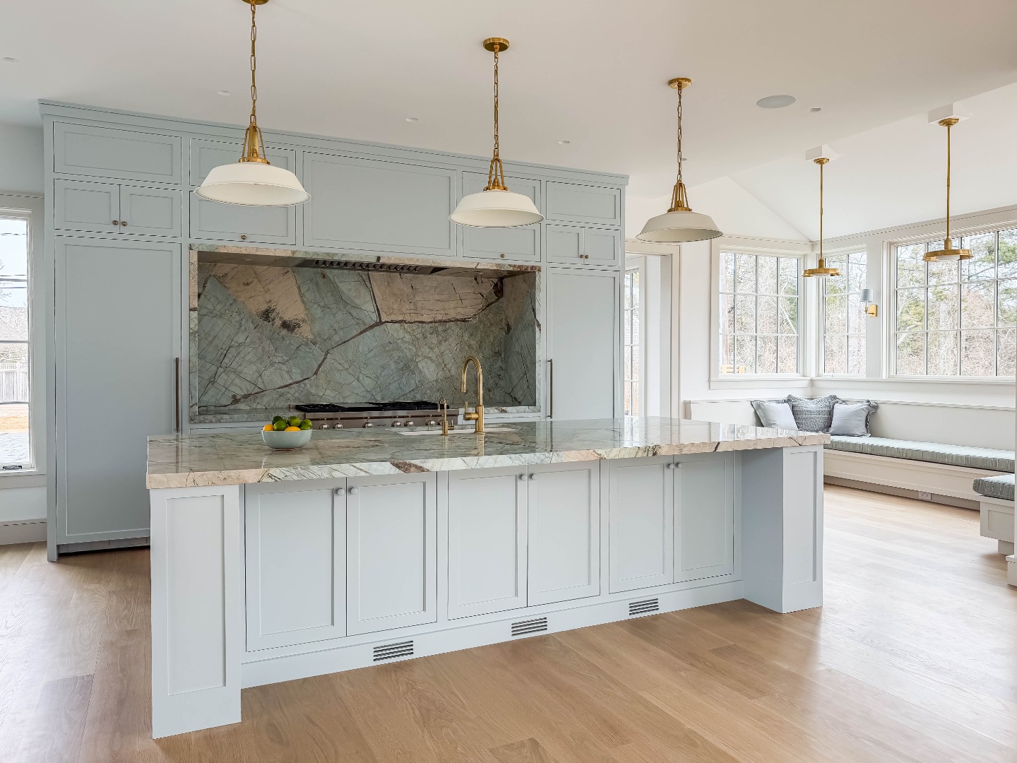 2 Lexington Avenue Edgartown, MA 02539 - Photo 16 of 41 a kitchen with stainless steel appliances granite countertop a stove a sink and a wooden floor