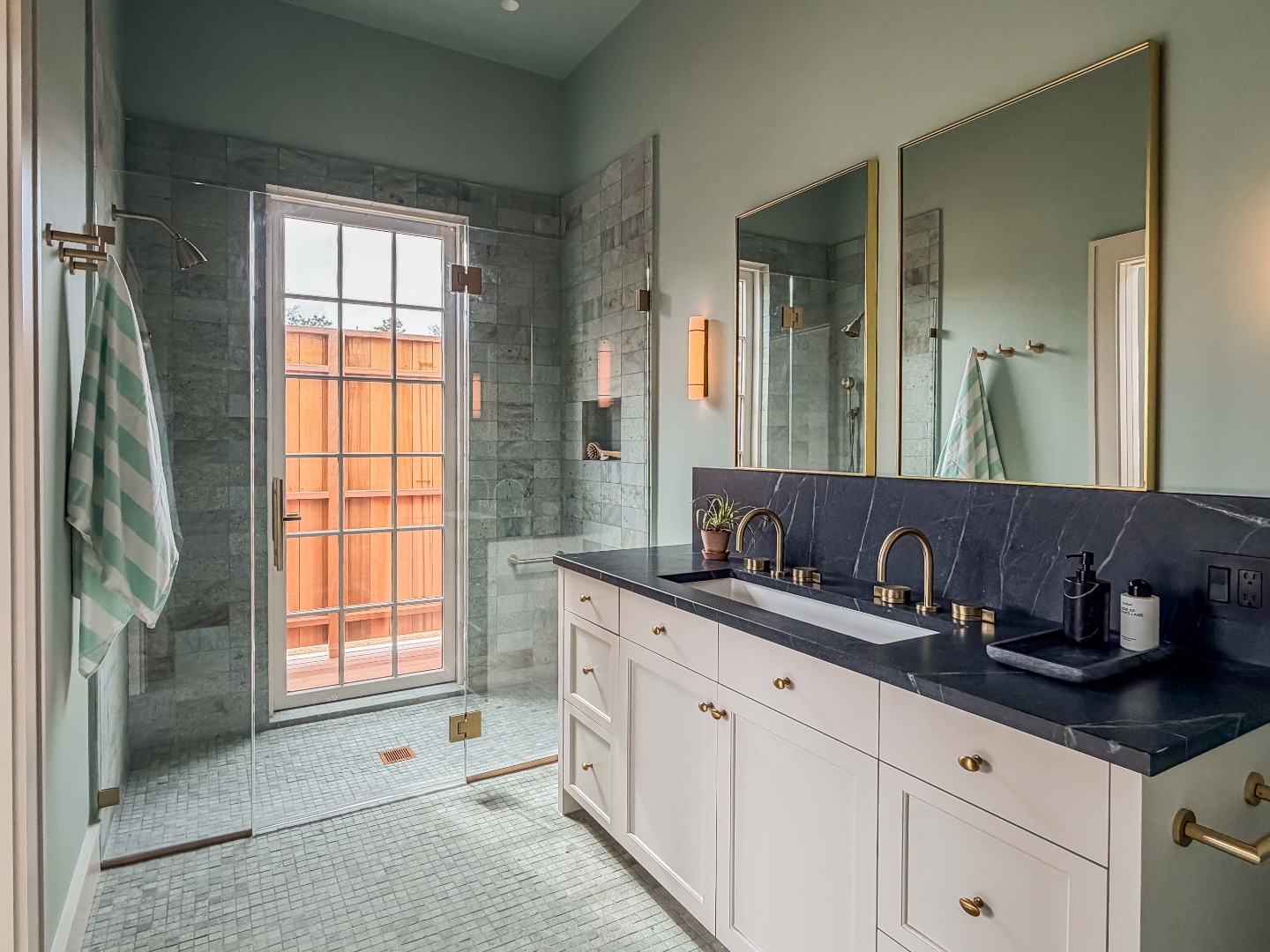 2 Lexington Avenue Edgartown, MA 02539 - Photo 26 of 41 a bathroom with a granite countertop sink and a mirror