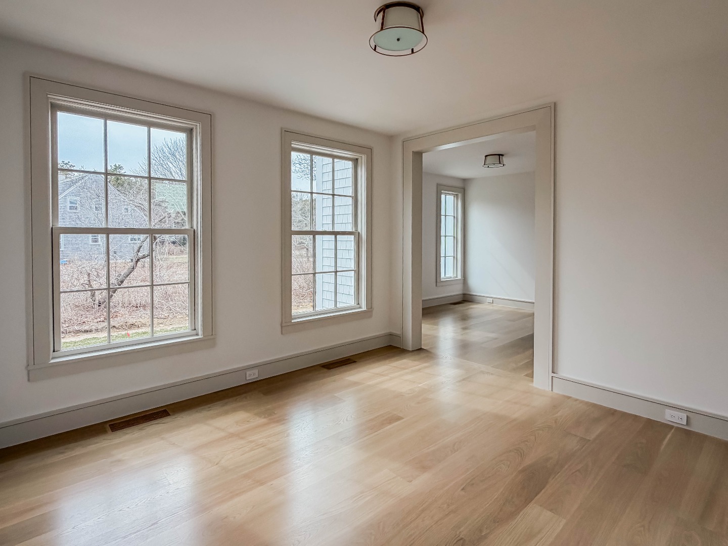 2 Lexington Avenue Edgartown, MA 02539 - Photo 33 of 41 an empty room with windows and closet