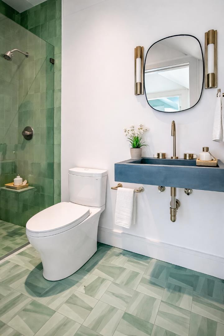 2 Lexington Avenue Edgartown, MA 02539 - Photo 38 of 41 a bathroom with a toilet sink and mirror