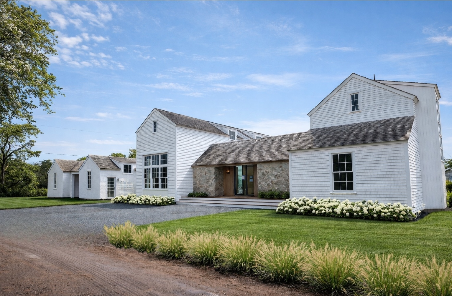 2 Lexington Avenue Edgartown, MA 02539 - Photo 5 of 41 a front view of a house with a yard table and chairs