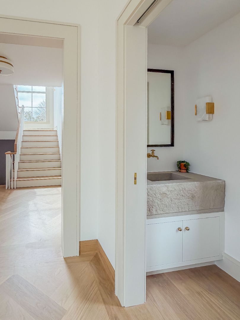 2 Lexington Avenue Edgartown, MA 02539 - Photo 8 of 41 a bathroom with a granite countertop sink and mirror